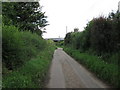 TM1137 : Lane to Grove Farm by Roger Jones