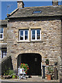 Cottage with stone slate roof...