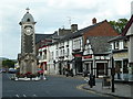 SN9768 : Clock tower and shops, Rhayader by Andrew Hill