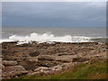 NH9487 : Tarbat Ness: waves at the point by Chris Downer