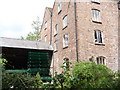 Old mill-wheel on a converted mill at Rindleford