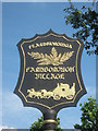 Close-up of Farnborough Village sign