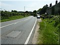 Houses on the A285 north of Coultershaw Bridge