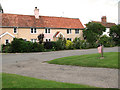 Pink cottages by the green, Middleton