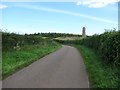 NU1433 : Minor road by Spindlestone Ducket by Richard Webb