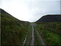 SS8495 : Path between the colliery spoil tips by Jeremy Bolwell