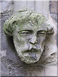 TQ2684 : Stone head by the entrance to St. Peter's Church, Belsize Park / Belsize Square, NW3 by Mike Quinn