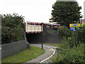 TQ1882 : Central Line train over cycle track by Hanger Lane Gyratory by David Hawgood
