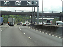 TQ1658 : M25 bridge carries Oxshott Road by Stuart Logan