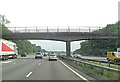 TQ4154 : M25 footbridge west of Clacket Lane Service Area by Stuart Logan