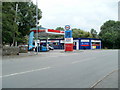 SN8706 : Esso filling station and Tesco Express, Glynneath by Jaggery