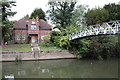 Lock keepers house and footbridge across the Thames