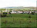 View northwards across farmland to new housing estates on the edge of Leitrim