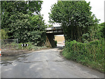 TR3364 : Railway bridge over Cottington Road by Nick Smith