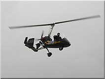 C8540 : Gyro-copter in flight, Portrush by Kenneth  Allen