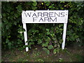 TM2256 : Warrens Farm sign by Geographer