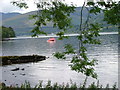 NN6223 : Boat and jetty on Loch Earn by Dave Fergusson