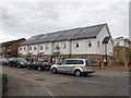 TQ2864 : Solar tiles on house roofs by Stephen Craven