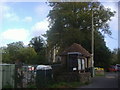 Bus shelter and rear of church, Offham