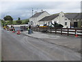 J1525 : Relaying the car park at Grant's Bar, Tamnaharry Hill by Eric Jones