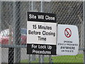 Signs on the gate of the Aughnagon Landfill Site