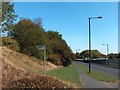 Holywell Road and public footpath sign