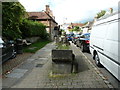 Old watering trough and village pump in the High Street Steyning