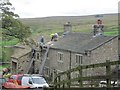 Re-roofing with traditional stone slabs