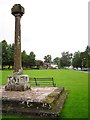NY4654 : Wetheral cross and village green by Rose and Trev Clough