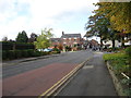 SJ7667 : Urban road heading towards the centre of Holmes Chapel by James Denham