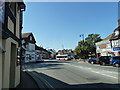 100 bus for Burgess Hill turning from the High Street into School Hill