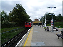 TQ2473 : Southfields station by Marathon