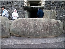 O0072 : Intricately carved stones at the entrance to the Newgrange Tomb by Eric Jones