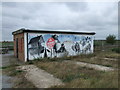 TQ5479 : Old army building with Mural on RSPB Rainham Marshes by PAUL FARMER