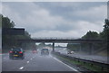 A wet day on the M6 near Day Green