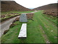 Bench and signage on part of the North Wales Path near Foel Lus