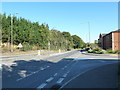 Junction of Portsmouth Road and the entrance to Milestone House