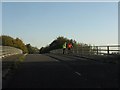 SP3608 : Cogges Hill Road crosses the A40 by Peter Whatley