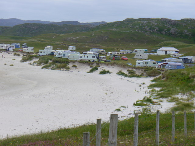 Berie Sands Caravan Park Busy site at Traigh na Beirigh with many caravans parked on the machair above the extensive sands.