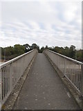 TQ5781 : Longpond footbridge by Roger Jones