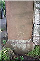 Benchmark on gatepost at entrance to Stanwix Church