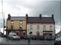 N5580 : Shops on The Square at Oldcastle by Eric Jones