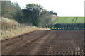 Ploughed field by former railway line