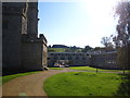 Keep of St Loe Castle with University buildings beyond