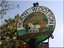 TF6424 : North Wootton Village Sign by Theo Foster