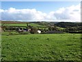 Looking over meadows towards Scobbiscombe Farm