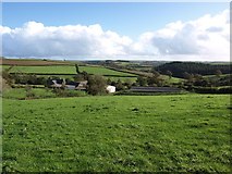 SX6050 : Looking over meadows towards Scobbiscombe Farm by David Gearing