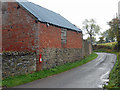 Postbox and farm building at Cleestanton