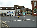 Scooter traversing a mini-roundabout