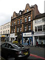 Old upper story in Queen Street